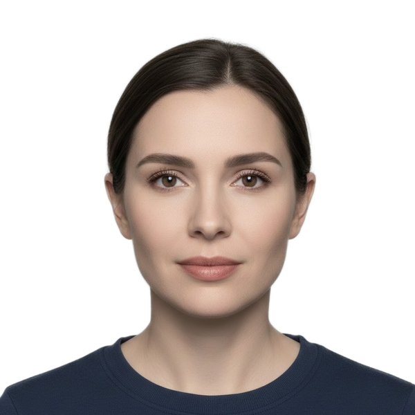 A woman demonstrating acceptable natural makeup for a passport photo with a neutral expression and clear facial features.